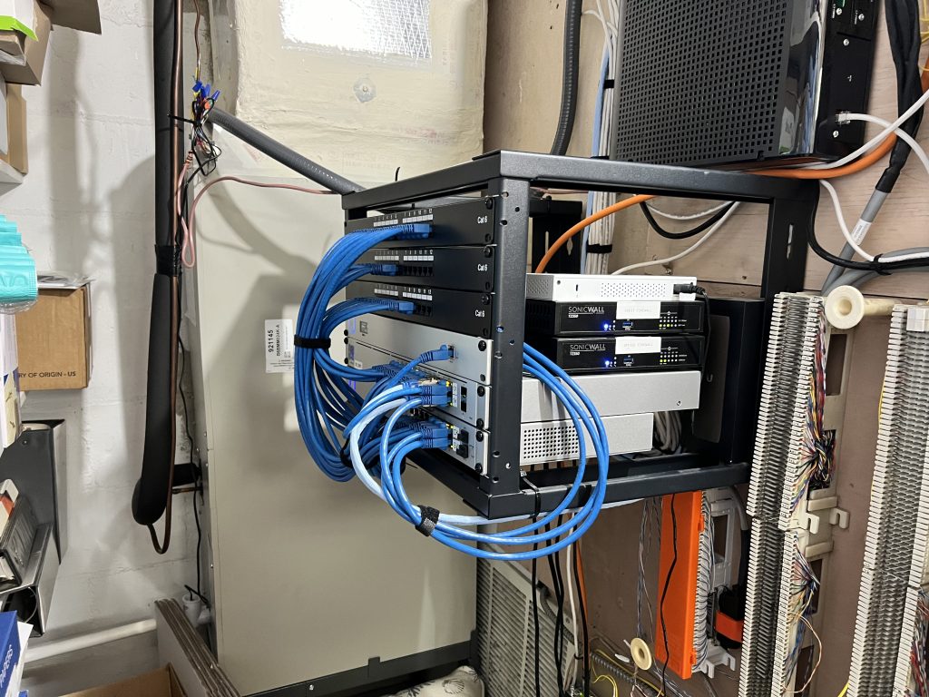 Large scale wireless networks with multiple access points providing seamless enterprise WiFi coverage